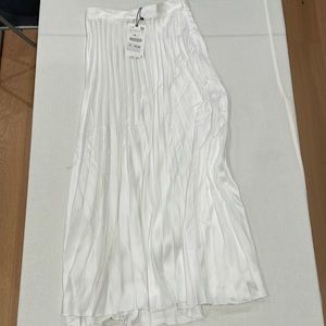Zara women’s white pleated midi skirt.  Brand New.  Tags attached.